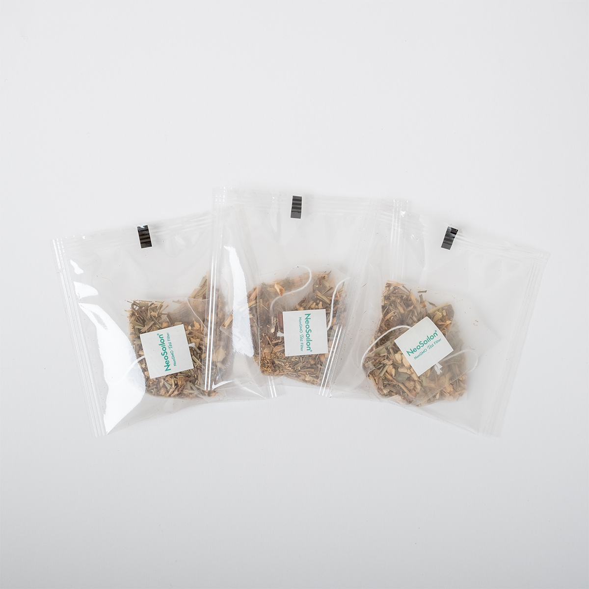 Efficient Production of Enveloped Triangular Tea Bags with One Machine